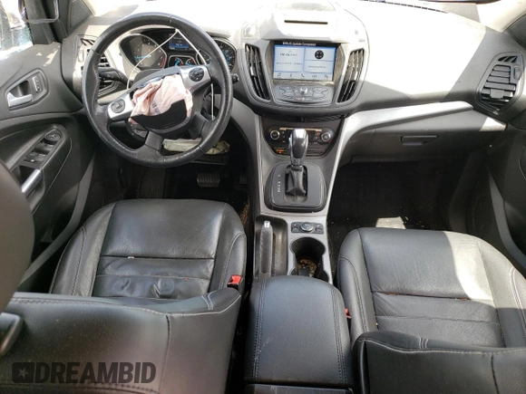 2016 Ford Escape SE z VIN 1FMCU9G9XGUC27074, wystawiony jako Copart lot #55788625 z przebiegiem 106 990 mil mil oraz Szkoda całkowita • Salvage title. Historia ofert i sprzedaży dostępna na DreamBid. Obrazek 8.