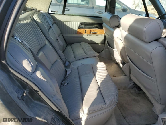 1996 Buick Park Avenue with VIN 1G4CW52K6TH648080, listed as a Copart auction lot 85089884 with 164,561 mi miles and Salvage Title. Bid and sale history available at carsss.com. Image 10.