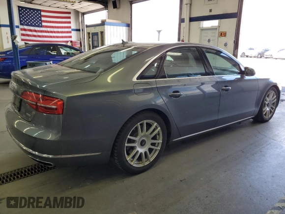 2015 Audi A8 with VIN WAUJGAFD3FN016587, listed as a Copart auction lot 60778904 with 116,818 mi miles and Clean title. Bid and sale history available at DreamBid. Image 3.