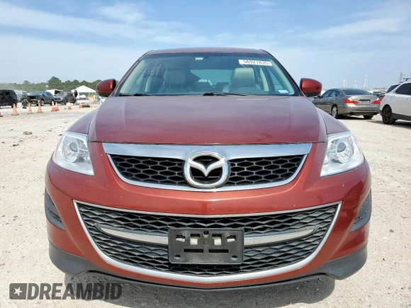 2012 Mazda CX-9 Touring z VIN JM3TB3CA1C0337995, wystawiony jako Copart lot #56921835 z przebiegiem 147 815 mil mil oraz Szkoda całkowita • Salvage title. Historia ofert i sprzedaży dostępna na DreamBid. Obrazek 5.