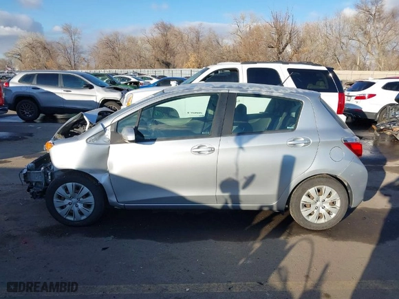 2012 Toyota Yaris L with VIN JTDKTUD36CD511401, listed as a IAAI auction lot 41321430 with 150,896 mi miles. Bid and sale history available at carsss.com. Image 14.