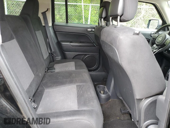 2014 Jeep Patriot High Altitude с VIN 1C4NJPFAXED507869, выставлен на аукционе Copart как лот 57944805 с пробегом 136 156 миль миль и Списание • Salvage title. История ставок и продаж доступна на DreamBid. Изображение 11.