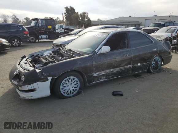 1998 Acura Integra LS with VIN JH4DB7655WS006377, listed as a Copart auction lot 42187355 with 165,638 mi miles and Salvage title. Bid and sale history available at DreamBid. Image 1.