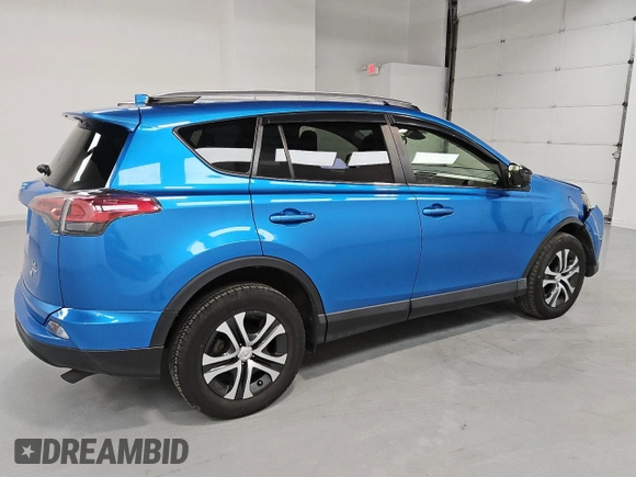 2018 Toyota RAV4 LE with VIN JTMBFREV5JD256838, listed as a Copart auction lot 48134385 with 59,831 mi miles and Clean Title. Bid and sale history available at DreamBid. Image 3.