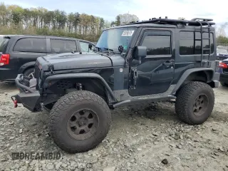 2015 Jeep Wrangler Sahara z VIN 1C4AJWBG8FL584959, wystawiony jako Copart lot #52850575 z przebiegiem Nie podano mil oraz Szkoda całkowita • Salvage title. Historia ofert i sprzedaży dostępna na DreamBid. Obrazek 1.