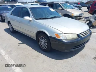 2001 Toyota Camry CE z VIN JT2BG22K410564839, wystawiony jako IAAI lot #42335896 z przebiegiem 239 063 mil mil oraz . Historia ofert i sprzedaży dostępna na DreamBid. Obrazek 1.