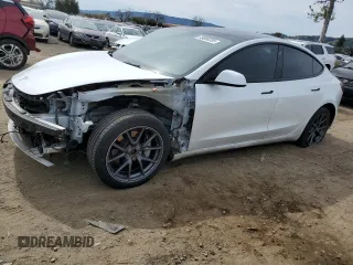 2022 Tesla Model 3 Long Range with VIN 5YJ3E1EB0NF123224, listed as a Copart auction lot 49890205 with 68,594 mi miles and Salvage Title. Bid and sale history available at DreamBid. Image 1.