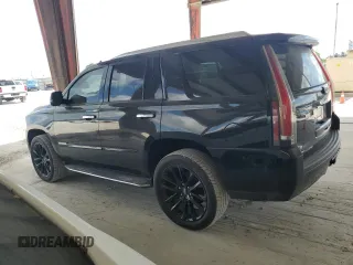 2020 Cadillac Escalade Luxury z VIN 1GYS3BKJXLR241205, wystawiony jako Copart lot #56461705 z przebiegiem 37 818 mil mil oraz Szkody całkowita. Historia ofert i sprzedaży dostępna na DreamBid. Obrazek 2.