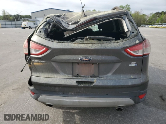 2015 Ford Escape SE with VIN 1FMCU9GXXFUC72335, listed as a Copart auction lot 51114735 with 157,471 mi miles and Salvage Title. Bid and sale history available at DreamBid. Image 6.