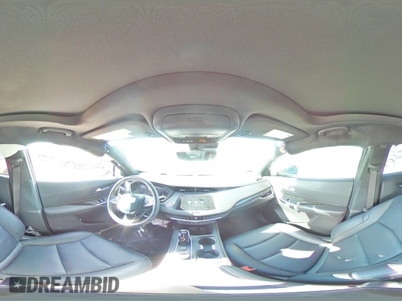 2023 Cadillac XT4 FWD Sport with VIN 1GYFZER47PF107311, listed as a Copart auction lot 87583565 with 26,585 mi miles and Salvage title. Bid and sale history available at DreamBid. Image 14.