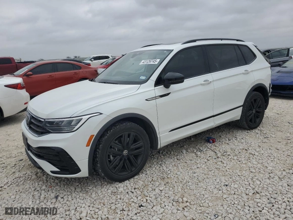 2022 Volkswagen Tiguan SE R-Line Black with VIN 3VVCB7AX0NM169257, listed as a Copart auction lot 43129745 with 59,517 mi miles and Salvage Title. Bid and sale history available at carsss.com. Image 1.