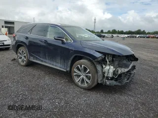 2018 Lexus RX 450hL Premium with VIN JTJDGKCAXJ2004699, listed as a Copart auction lot 63673635 with 6,850 mi miles and Salvage title. Bid and sale history available at DreamBid. Image 4.