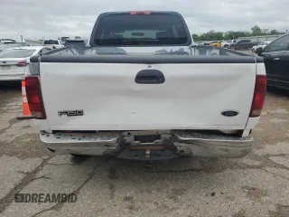 2002 Ford F-150 XL with VIN 1FTRX17L52KC49698, listed as a Copart auction lot 54307145 with 254,394 mi miles and Salvage title. Bid and sale history available at DreamBid. Image 6.