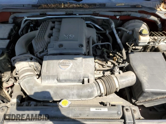 2007 Nissan Frontier SE z VIN 1N6AD07U87C453399, wystawiony jako Copart lot #54056815 z przebiegiem 177 034 mil mil oraz Szkoda całkowita • Salvage title. Historia ofert i sprzedaży dostępna na DreamBid. Obrazek 11.