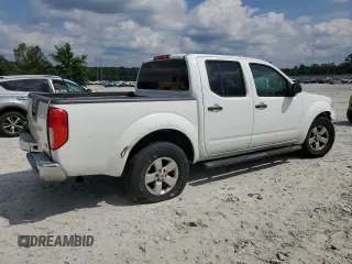 2009 Nissan Frontier SE with VIN 1N6AD07U19C411546, listed as a Copart auction lot 57683625 with 216,492 mi miles and Salvage title. Bid and sale history available at DreamBid. Image 3.