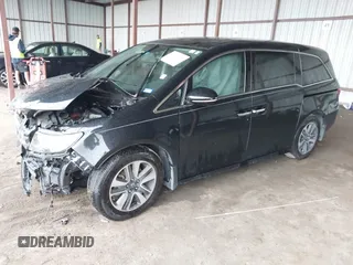 2014 Honda Odyssey Touring with VIN 5FNRL5H98EB095835, listed as a IAAI auction lot 42153412 with 124,131 mi miles and . Bid and sale history available at DreamBid. Image 18.