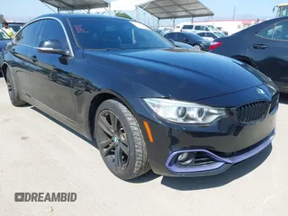 2016 BMW 4 Series 428i xDrive z VIN WBA4C9C58GG141210, wystawiony jako IAAI lot #42218036 z przebiegiem 88 864 mil mil oraz . Historia ofert i sprzedaży dostępna na DreamBid. Obrazek 1.