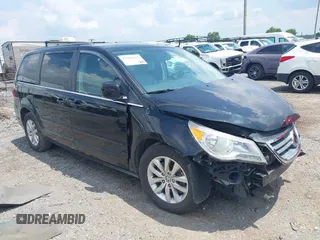 2012 Volkswagen Routan SE with VIN 2C4RVABG1CR202638, listed as a IAAI auction lot 42696427 with 238,664 mi miles and . Bid and sale history available at DreamBid. Image 1.