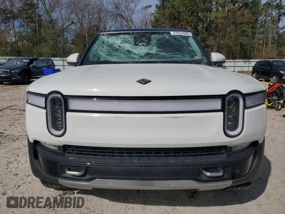 2024 Rivian R1S Adventure z VIN 7PDSGABA1RN030813, wystawiony jako Copart lot #47614385 z przebiegiem 16 946 mil mil oraz Szkody całkowita. Historia ofert i sprzedaży dostępna na DreamBid. Obrazek 5.