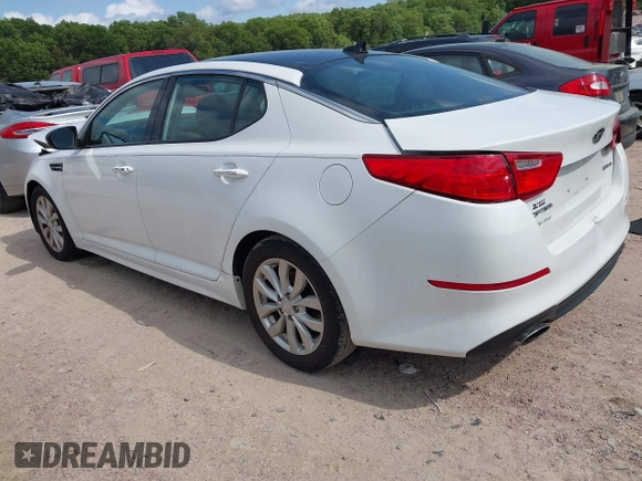 2015 Kia Optima EX with VIN 5XXGN4A77FG497218, listed as a IAAI auction lot 42464839 with 128,355 mi miles and . Bid and sale history available at DreamBid. Image 3.