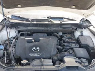 2017 Mazda CX-5 Sport with VIN JM3KFABL5H0124725, listed as a IAAI auction lot 40487298 with 103,889 mi miles. Bid and sale history available at carsss.com. Image 10.