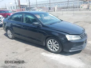 2015 Volkswagen Jetta SE z VIN 3VWD17AJXFM259306, wystawiony jako IAAI lot #42418042 z przebiegiem 199 780 mil mil oraz . Historia ofert i sprzedaży dostępna na DreamBid. Obrazek 1.