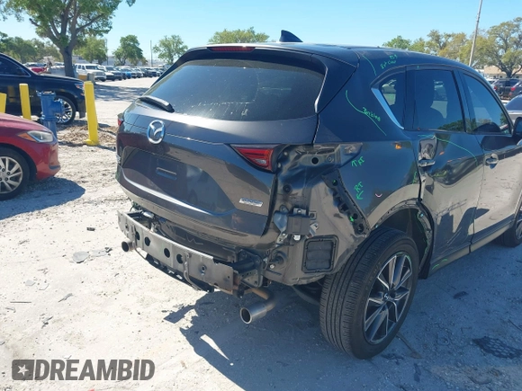 2018 Mazda CX-5 Grand Touring with VIN JM3KFBDM8J0314925, listed as a IAAI auction lot 41825917 with 70,027 mi miles. Bid and sale history available at carsss.com. Image 6.
