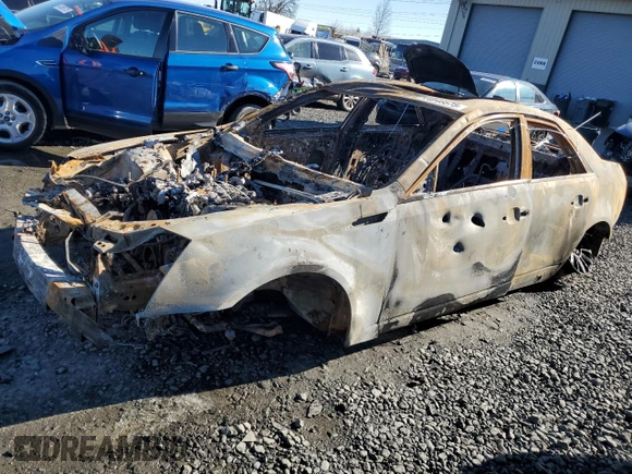 2010 Cadillac CTS with VIN 1G6DA5EG4A0125945, listed as a Copart auction lot 44948575 with Not Provided miles and Salvage Title. Bid and sale history available at DreamBid. Image 1.