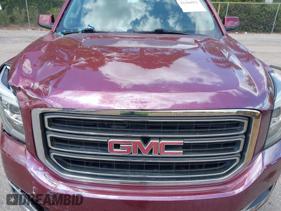 2020 GMC Yukon SLT z VIN 1GKS1BKC4LR242383, wystawiony jako IAAI lot #42104912 z przebiegiem 55 017 mil mil oraz . Historia ofert i sprzedaży dostępna na DreamBid. Obrazek 10.