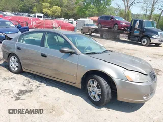 2005 Nissan Altima S z VIN 1N4AL11DX5C398493, wystawiony jako IAAI lot #42077990 z przebiegiem 163 838 mil mil oraz . Historia ofert i sprzedaży dostępna na DreamBid. Obrazek 1.