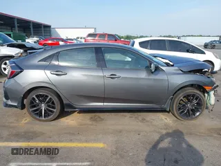 2021 Honda Civic Sport with VIN SHHFK7H44MU217741, listed as a IAAI auction lot 42029373 with 68,572 mi miles and . Bid and sale history available at DreamBid. Image 14.