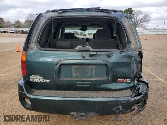 2004 GMC Envoy SLE with VIN 1GKDS13SX42234675, listed as a Copart auction lot 48780955 with 217,790 mi miles and Salvage Title. Bid and sale history available at carsss.com. Image 6.