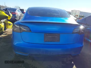 2022 Tesla Model 3 Performance z VIN 5YJ3E1EC9NF337945, wystawiony jako IAAI lot #41419561 z przebiegiem Nie podano mil oraz . Historia ofert i sprzedaży dostępna na DreamBid. Obrazek 15.