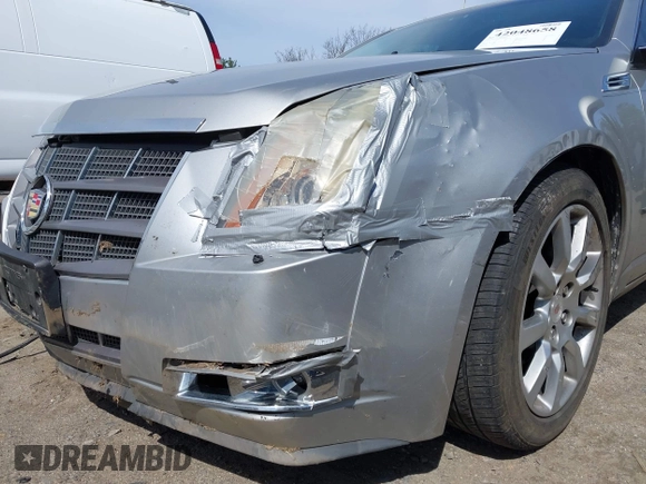2008 Cadillac CTS RWD z VIN 1G6DV57V380138406, wystawiony jako IAAI lot #42048658 z przebiegiem 125 923 mil mil oraz . Historia ofert i sprzedaży dostępna na DreamBid. Obrazek 12.
