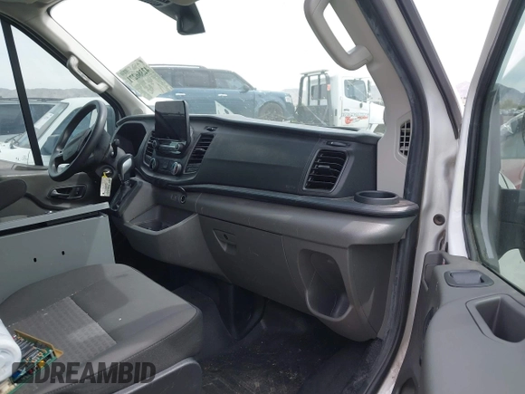 2020 Ford Transit Cargo with VIN 1FTBR1CG8LKA69072, listed as a IAAI auction lot 42386271 with Not provided miles and . Bid and sale history available at DreamBid. Image 5.