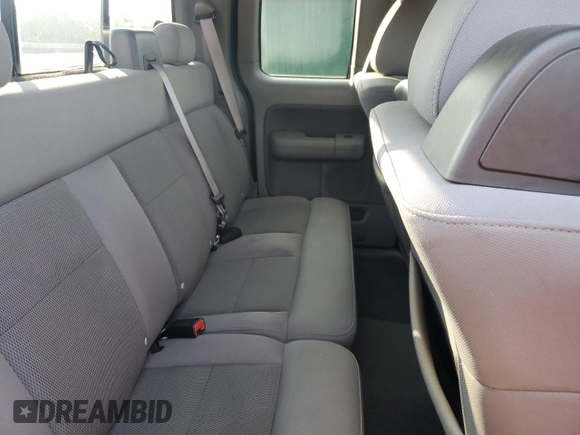 2004 Ford F-150 STX with VIN 1FTRX02W14KC05308, listed as a Copart auction lot 59561405 with 354,269 mi miles and Salvage title. Bid and sale history available at DreamBid. Image 10.