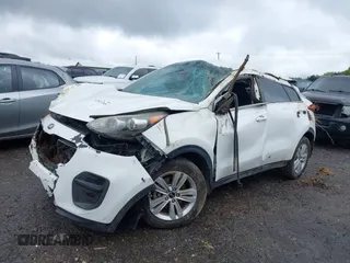 2017 Kia Sportage LX with VIN KNDPM3AC1H7212938, listed as a IAAI auction lot 42015705 with 85,649 mi miles and . Bid and sale history available at DreamBid. Image 2.