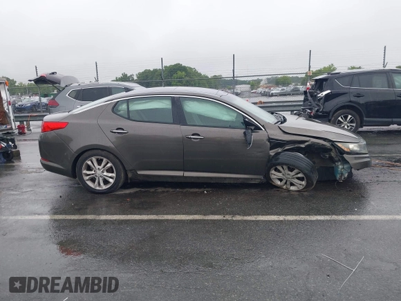 2013 Kia Optima EX with VIN 5XXGN4A78DG127294, listed as a IAAI auction lot 42364450 with 142,722 mi miles and . Bid and sale history available at DreamBid. Image 12.