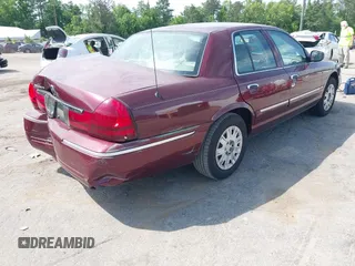 2005 Mercury Grand Marquis GS z VIN 2MEFM74W05X641274, wystawiony jako IAAI lot #42298098 z przebiegiem 159 424 mil mil oraz . Historia ofert i sprzedaży dostępna na DreamBid. Obrazek 4.