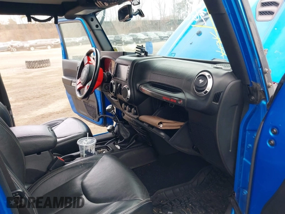 2016 Jeep Wrangler Unlimited Rubicon with VIN 1C4BJWFG2GL192074, listed as a IAAI auction lot 41598861 with 70,000 mi miles and . Bid and sale history available at DreamBid. Image 5.