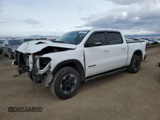 2019 Ram 1500 Rebel with VIN 1C6SRFLT1KN897382, listed as a Copart auction lot 48529255 with 124,324 mi miles and Salvage title. Bid and sale history available at DreamBid. Image 1.