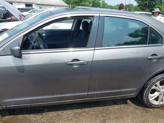 2012 Ford Fusion SE with VIN 3FAHP0HAXCR390109, listed as a IAAI auction lot 42470688 with 105,837 mi miles and . Bid and sale history available at DreamBid. Image 14.