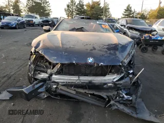 2023 BMW 8 Series 840i with VIN WBADZ4C05PCM43258, listed as a Copart auction lot 76588524 with Not provided miles and Salvage title. Bid and sale history available at DreamBid. Image 5.