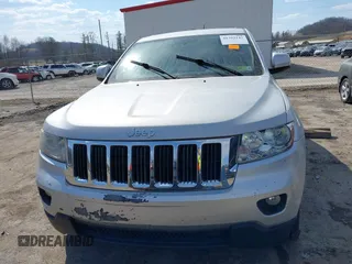 2013 Jeep Grand Cherokee Laredo with VIN 1C4RJFAG5DC634685, listed as a IAAI auction lot 41792147 with 260,594 mi miles. Bid and sale history available at carsss.com. Image 12.