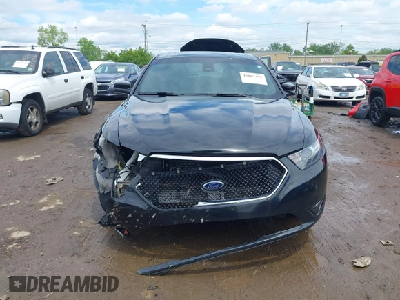 2015 Ford Taurus SHO with VIN 1FAHP2KT1FG196151, listed as a IAAI auction lot 42187492 with 131,833 mi miles and . Bid and sale history available at DreamBid. Image 13.