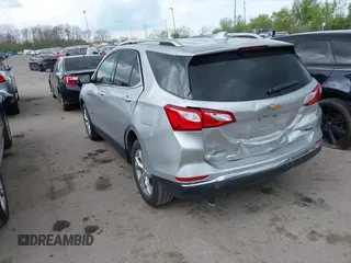 2018 Chevrolet Equinox Premier with VIN 2GNAXMEV7J6106781, listed as a IAAI auction lot 42113301 with 114,585 mi miles. Bid and sale history available at carsss.com. Image 3.