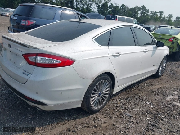 2014 Ford Fusion Titanium Hybrid with VIN 3FA6P0RU0ER329063, listed as a IAAI auction lot 40072913 with 210,274 mi miles. Bid and sale history available at carsss.com. Image 4.