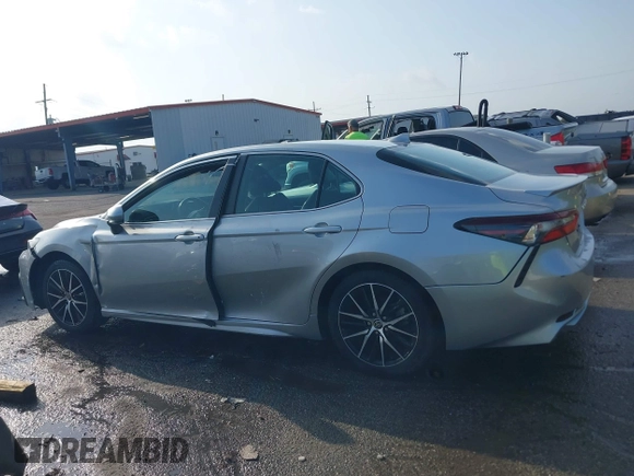 2021 Toyota Camry SE Nightshade with VIN 4T1G11AKXMU599663, listed as a IAAI auction lot 41902392 with 76,909 mi miles. Bid and sale history available at carsss.com. Image 14.