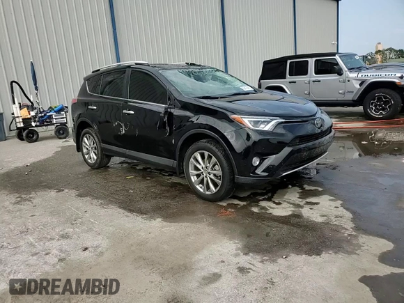 2016 Toyota RAV4 Limited with VIN 2T3DFREV2GW471288, listed as a Copart auction lot 59413885 with 50,023 mi miles and Salvage title. Bid and sale history available at DreamBid. Image 14.