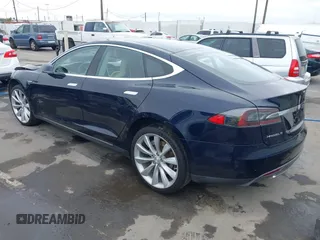 2014 Tesla Model S 60 with VIN 5YJSA1H10EFP30234, listed as a IAAI auction lot 42182249 with 186,654 mi miles and . Bid and sale history available at DreamBid. Image 3.